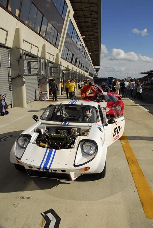 White Mini Marcos in pits